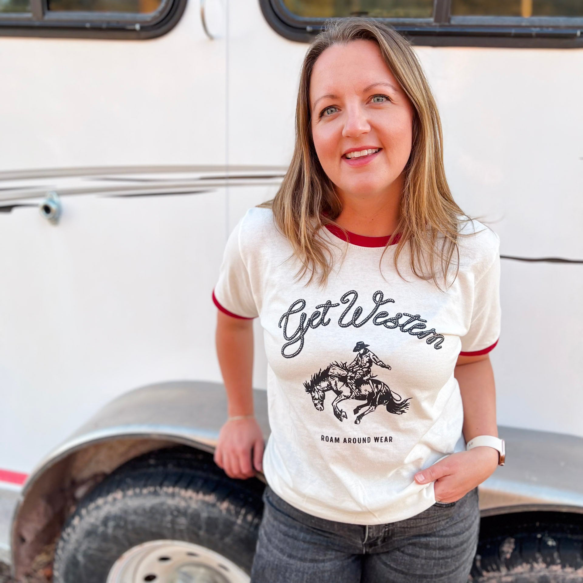 Get Western Cowboy and Rider print in black on a vintage inspired red/white unisex ringer tee. Wyoming tee. Rodeo Tee. Western t-shirt. Roam Around Wear is a Wyoming t-shirt company based out of Gillette, Wyoming
