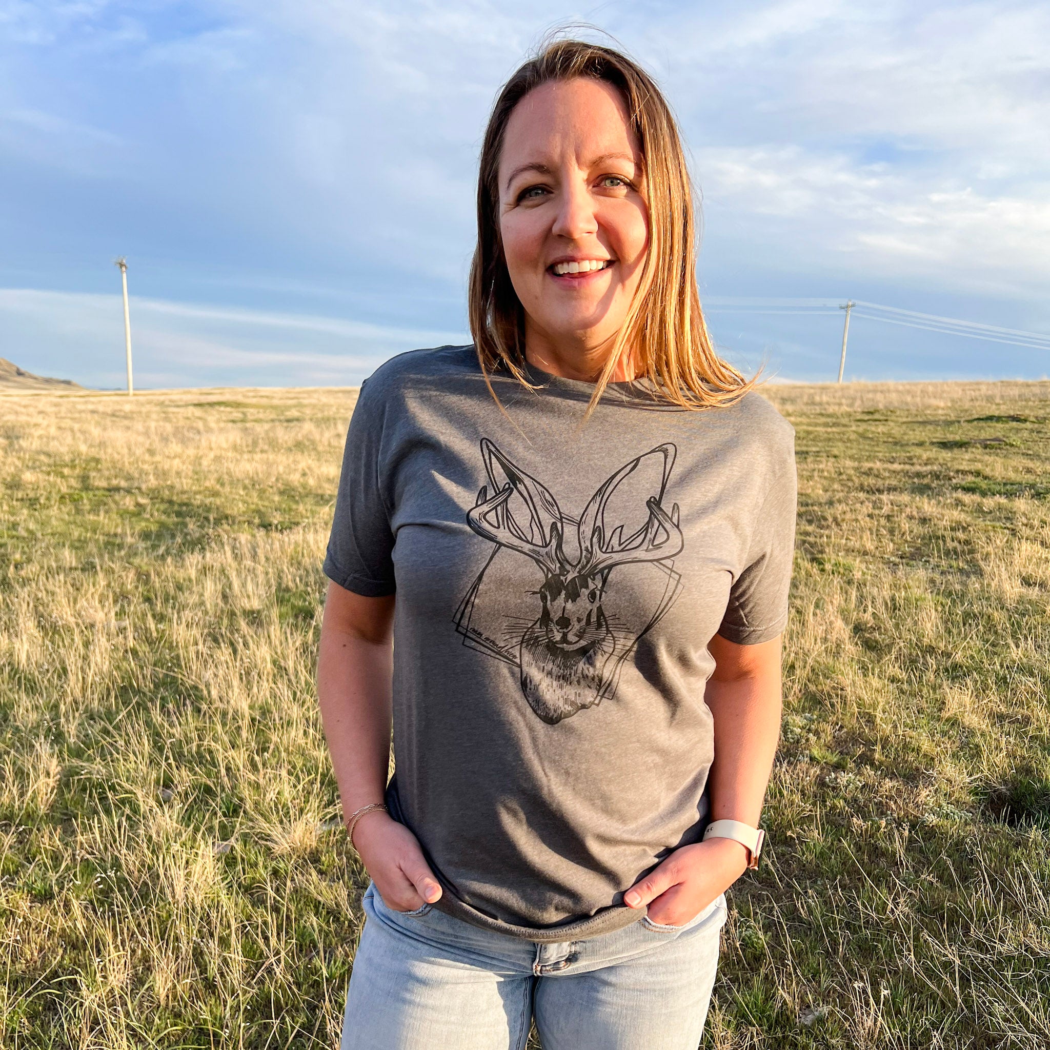Roam Around Wear is a Wyoming t-shirt company based out of Gillette, Wyoming. Wyoming Jackalope  t-shirt. Unisex tee shirt. Artisan designed.