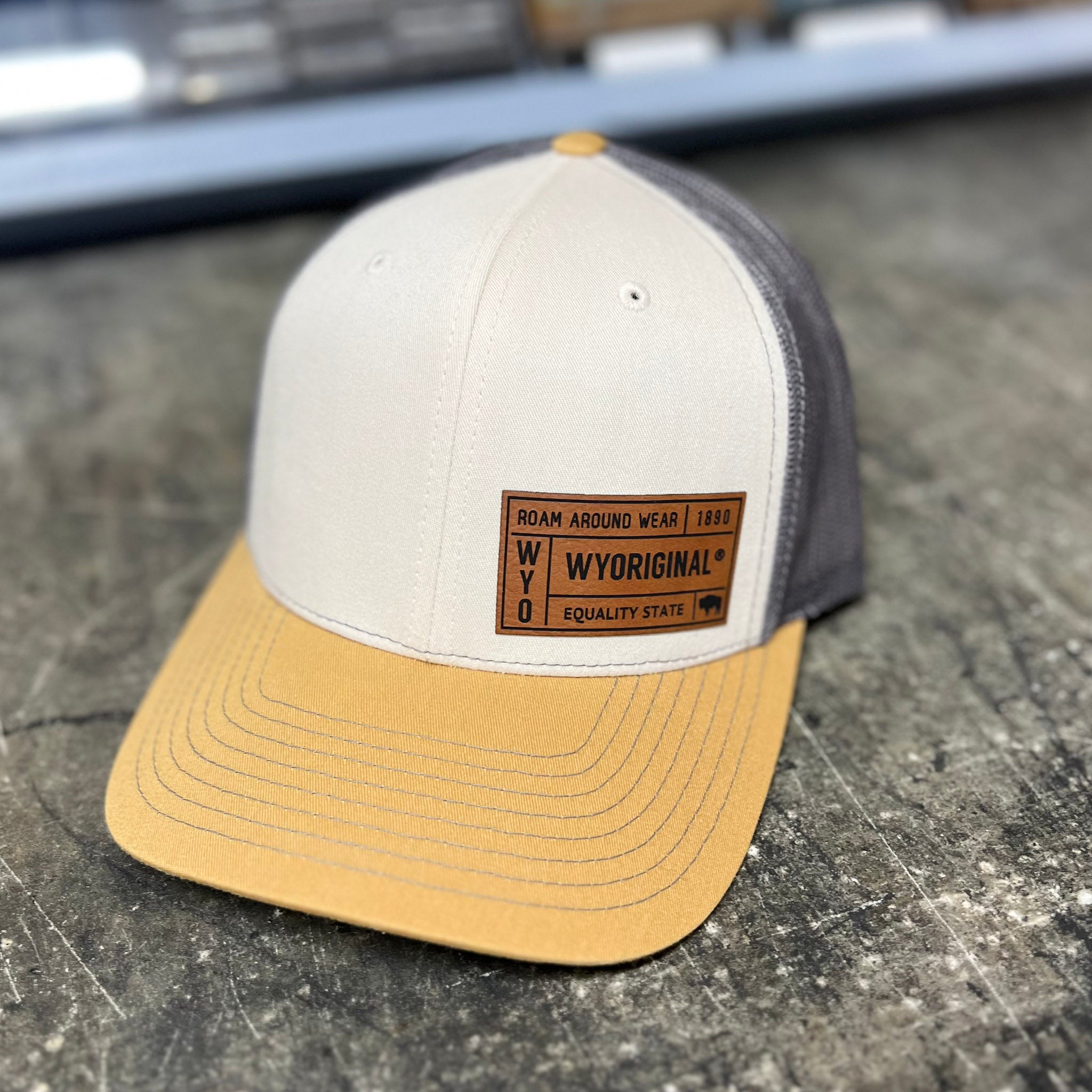 Tri color WYORIGINAL hat. Wyoming trucker hat. Roam Around Wear is a Wyoming t-shirt company based in Gillette, Wyoming