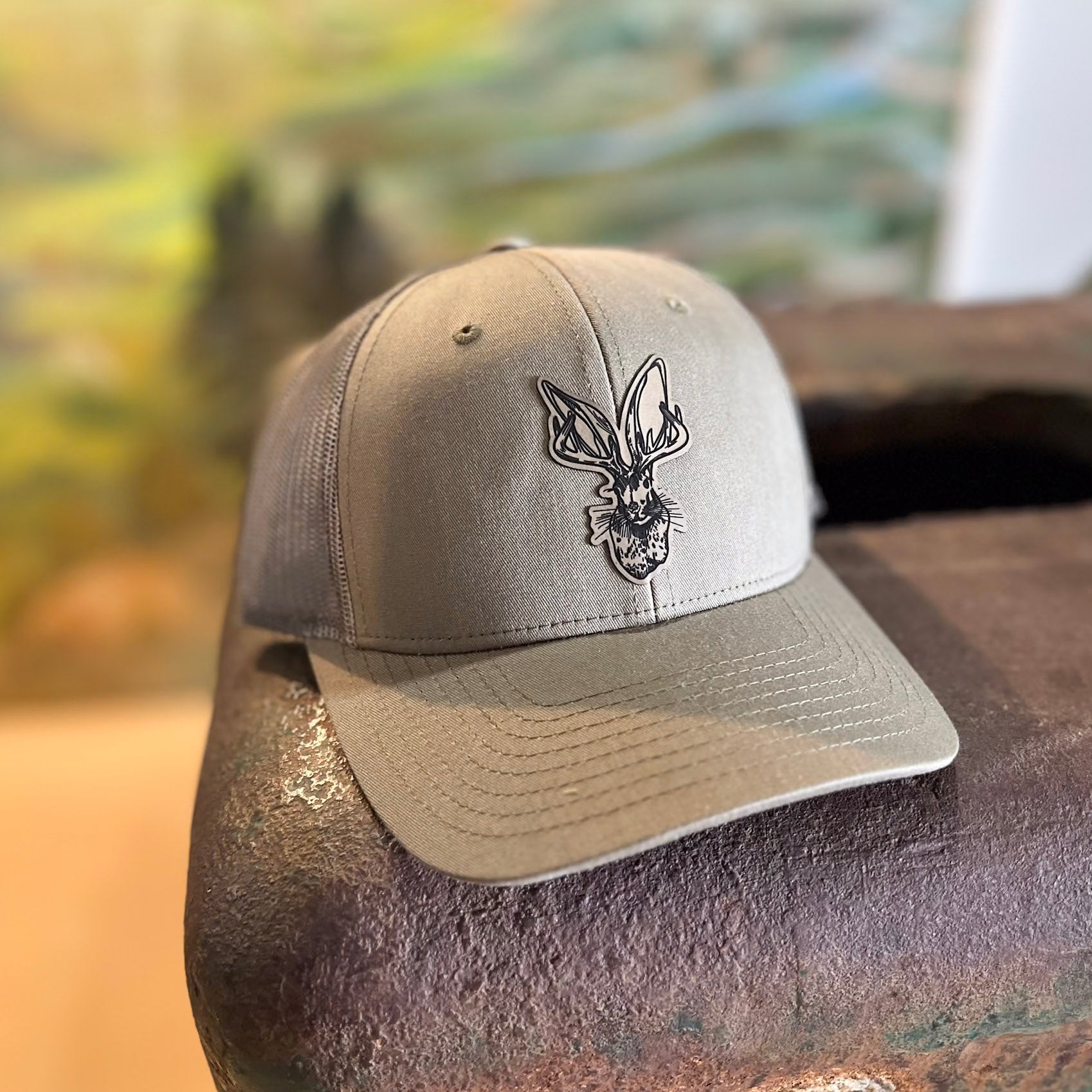 Jackalope hat. Artisan designed. Wyoming trucker hat. Roam Around Wear is a Wyoming t-shirt company based in Gillette, Wyoming