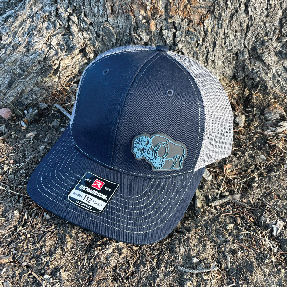 Navy/Charcoal Bison trucker hat. Unique wyoming hats. Roam Around Wear is a Wyoming t-shirt company based in Gillette, WY