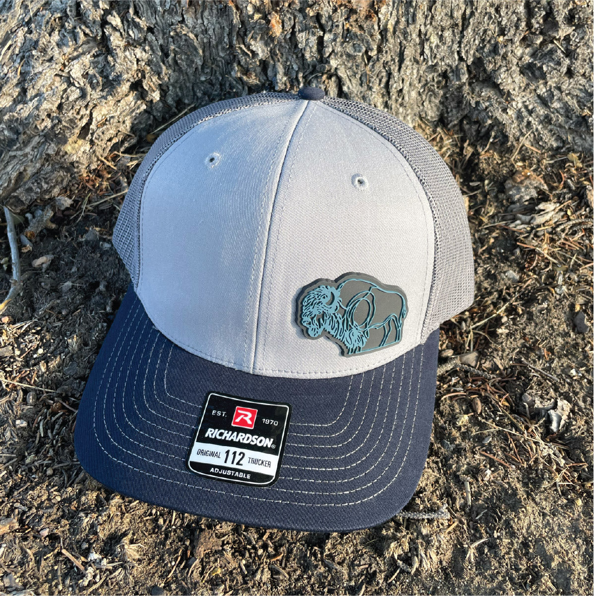 Gray/Navy/Charcoal Bison trucker hat. Unique wyoming hats. Roam Around Wear is a Wyoming t-shirt company based in Gillette, WY